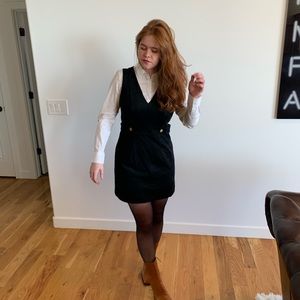 Black faux suede mini dress with gold buttons